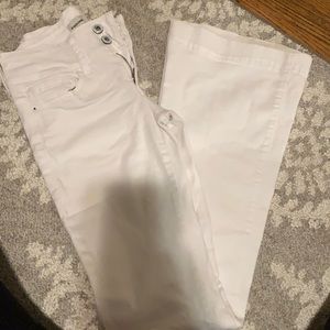 White sneak peek flare leg jeans